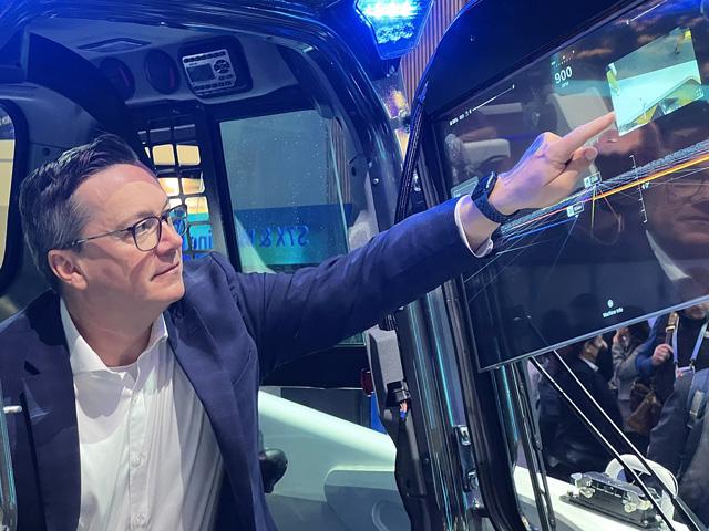 Joel Honeyman offers insight into Bobcat's advanced display technology that uses machinery glass as a provider of information about work being performed and about the worksite around the machine. (DTN photo by Dan Miller)