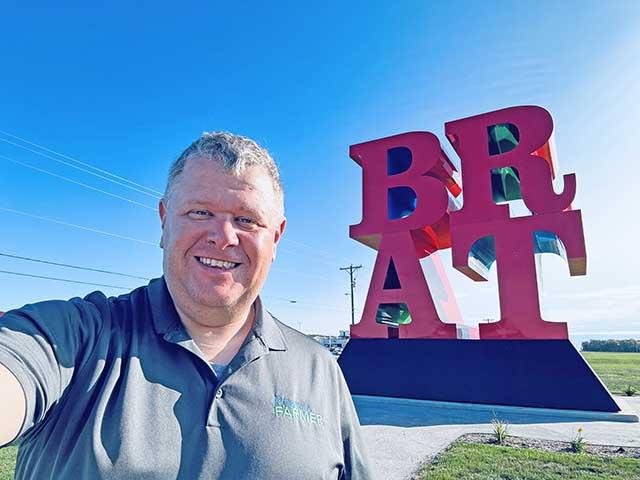 There's some controversy about whether the BRAT sculpture at the Johnsonville brat company's headquarters is actually the work of famed artist Robert Indiana, who crafted the similarly styled and much more famous "LOVE." There was no doubt I was going to take a picture with it, though.(DTN photo by Joel Reichenberger)