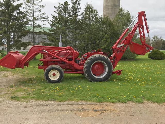 A red tractor for Valentine's Day. This 1956 International 300 tractor equipped with a Wagner backhoe is owned by Robert Robinson of Parkhill, Ontario, Canada. (Photo courtesy of Robert Robinson)