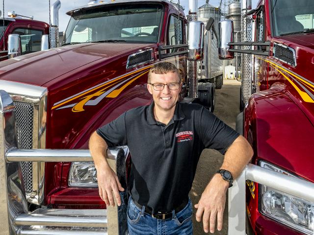 Erik Oberbroeckling's fleet of 22 trucks logs an average of 2 million miles a year, all while helping the farm grow. (Photo by Mark Tade)