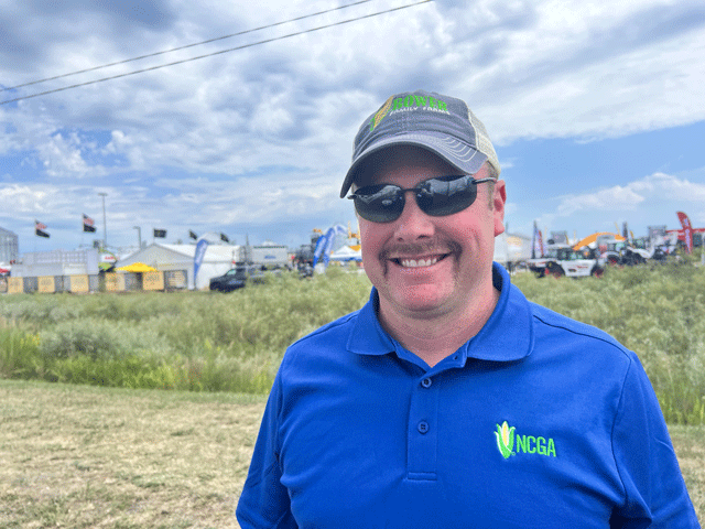 Tuesday started out hot at the Farm Progress Show, but clouds loomed on the horizon much like the clouds now over the farm economy. Jed Bowers, first vice president-elect of the National Corn Growers Association, said farmers are frustrated about the lack of movement in Congress on a farm bill. (DTN photo by Chris Clayton)