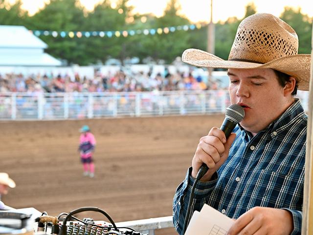 Jarrett Orman of Miami, Oklahoma, announces the Adel Breakout Rodeo in Adel, Iowa, recently. Orman, 21, travels the country announcing and doing sound at several rodeos. (DTN/Progressive Farmer photo by Jennifer Carrico)