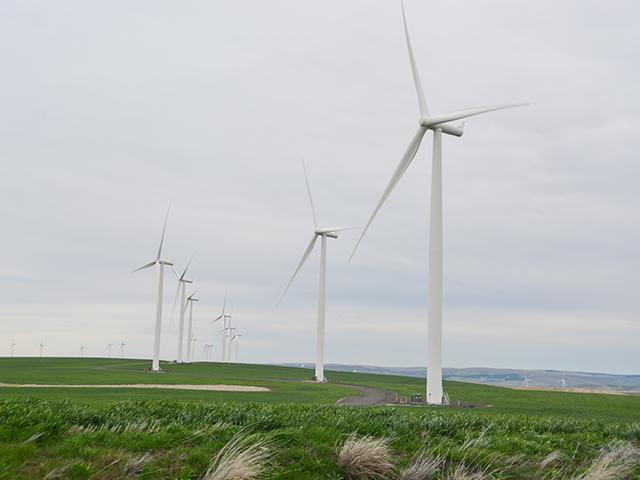 A wind turbine farm in northwest Missouri. President Joe Biden and USDA officials on Thursday will announce $7.3 billion in funding for rural electric cooperatives from the Inflation Reduction Act to produce clean energy. Administration officials are highlighting clean-energy projects to tout the Biden-Harris term's economic moves. (DTN photo by Chris Clayton)