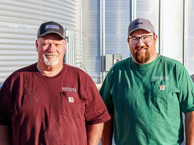 Father and son Lee and Logan Brooke farm land first owned by their family in 1869. (Elaine Shein)