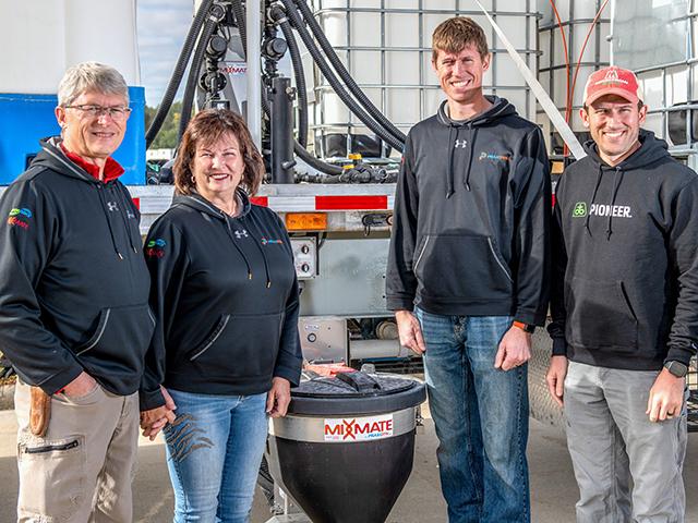 The Applegate family, from left, Doug, Kathy, Brent and Luke, created the Mixmate system on their eastern Iowa farm. (Joel Reichenberger)