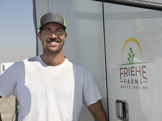 Second-generation farmer Derek Friehe uses the National Wheat Yield Contest to see if his farm's yields measure up. This year, his entry topped the irrigated spring wheat category. (DTN photo by Joel Reichenberger)