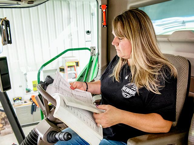 Tara Barrett-Duzan traded the news desk for a tractor seat in a fight to keep her family farm legacy alive. (DTN/Progressive Farmer photo by Jason Jenkins)