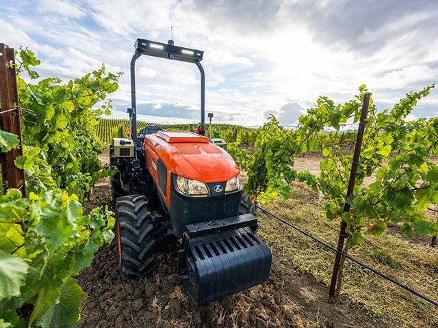 Kubota has added an autonomous package to its M5 Narrow tractor platform. Four of the units will be operating this year among the rows of a large vineyard operation in California. (Photo courtesy of Kubota)