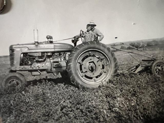 Russ Quinn's grandpa, John B. "Jack" Quinn, and Jack's son (Russ' uncle), James V. Quinn, were photographed in spring 1951 on Russ' grandpa's 1945 Farmall M, plowing the family farm east of Elkhorn, Nebraska. Among the vintage iron Russ would like in his shed is this long-lost tractor. (Photo courtesy of Russ Quinn)
