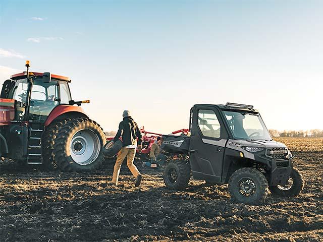 RANGER XP 1000 CAB is available in a 3-seat or CREW configuration and comes equipped with a factory-installed enclosed cab with both heating and air conditioning features. The RANGER box has a capacity of 1,000 pounds and has 2,500-pound towing capacity. (Photo courtesy of Polaris Off Road)