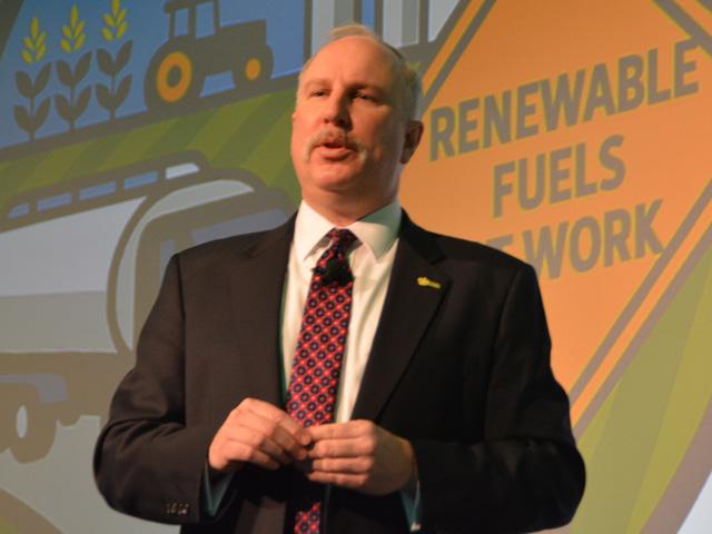 Monte Shaw, executive director of the Iowa Renewable Fuels Association, presses for Congress to pass E15 legislation this month at the Iowa Renewable Fuels Summit. Speakers also highlighted the need for lower-carbon fuels to market for both aviation and maritime use. (DTN photo by Chris Clayton)