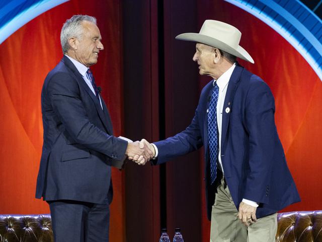 Secretary of Health and Human Services Robert F. Kennedy Jr. (left) shakes hands with National Cattlemen's Beef Association President Buck Wehrbein after the two chatted on the stage about the new dietary guidelines at CattleCon in Nashville, Tennessee, last week. (Photo courtesy of NCBA)