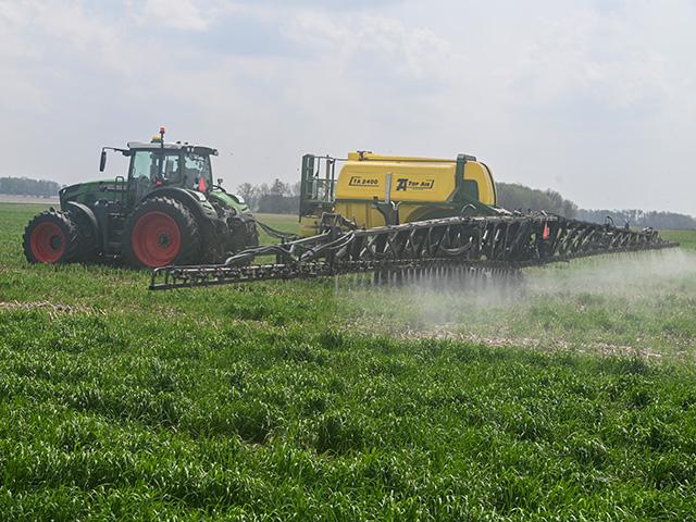 An Iowa farmer terminating a cover crop with a glyphosate mix. President Donald Trump on Wednesday signed an executive order to protect the domestic production of glyphosate and elemental phosphorus as well. (DTN file photo)