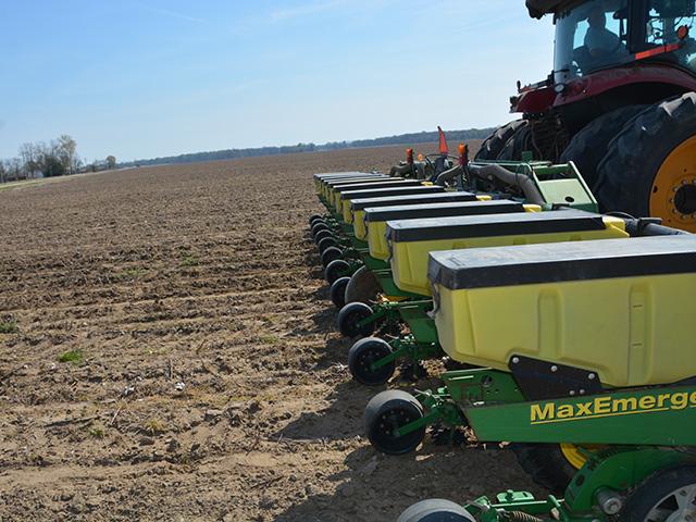 An Arkansas farmer planting corn in a dry field. Eastern Arkansas is extremely dry for spring planting, but some farmers are also planting more corn than in the past. (DTN photo by Chris Clayton)